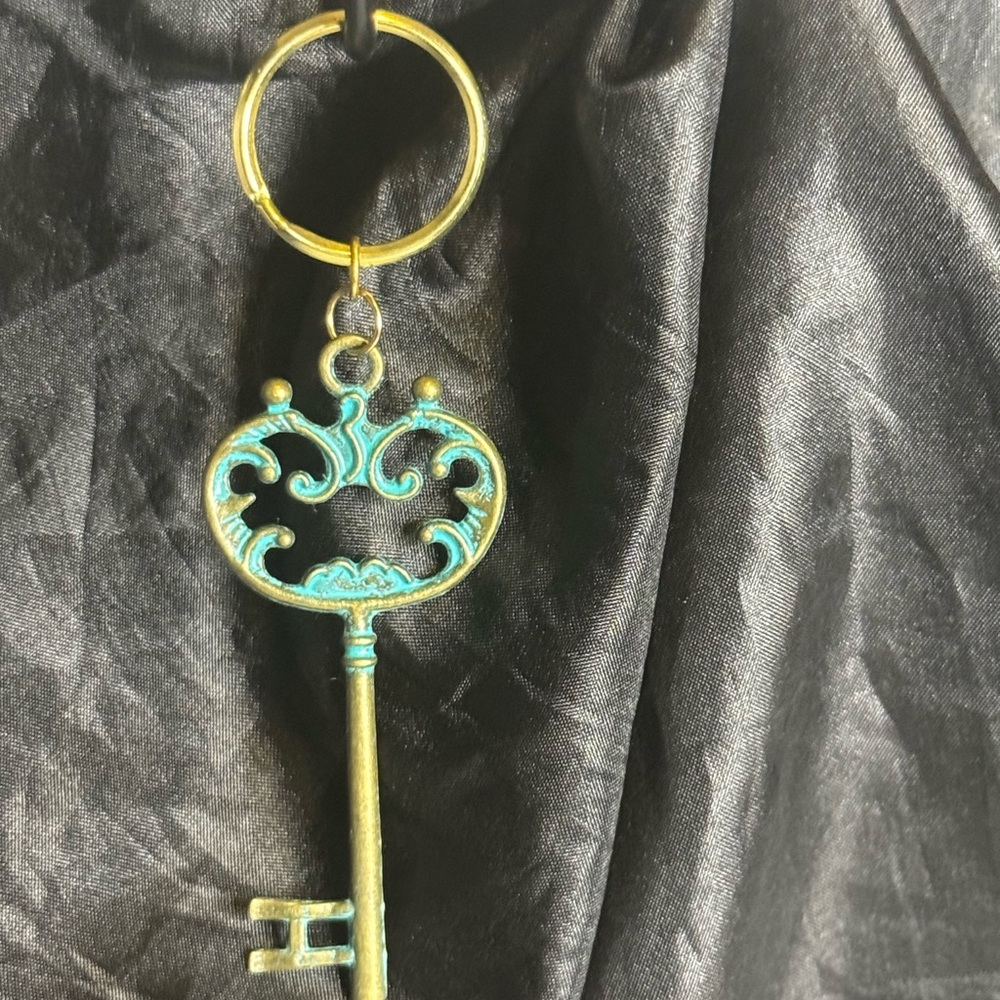 Elegant Gold and Turquoise Key Pendant